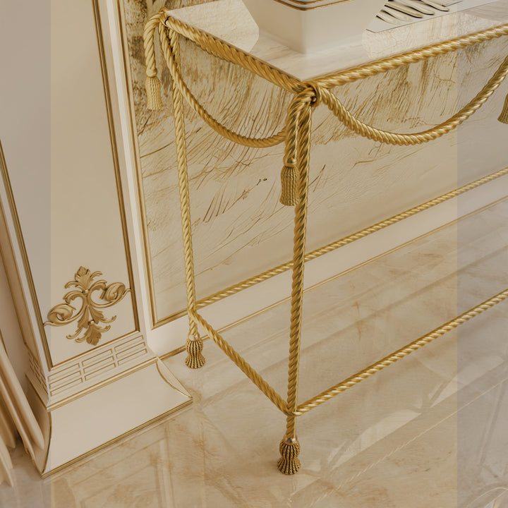 Close-up of the table’s corner showing the gold rope detailing and tassel leg