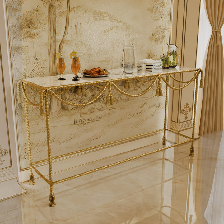 Angled view of the Allegra Console Table with decorative pastries and fruit bowls.