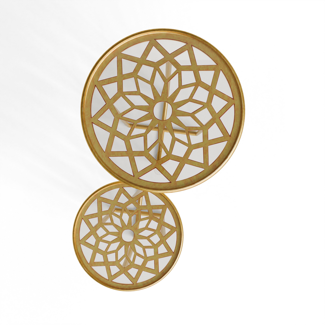 Top-down view of Zara nesting tables revealing overlapping gold star motifs