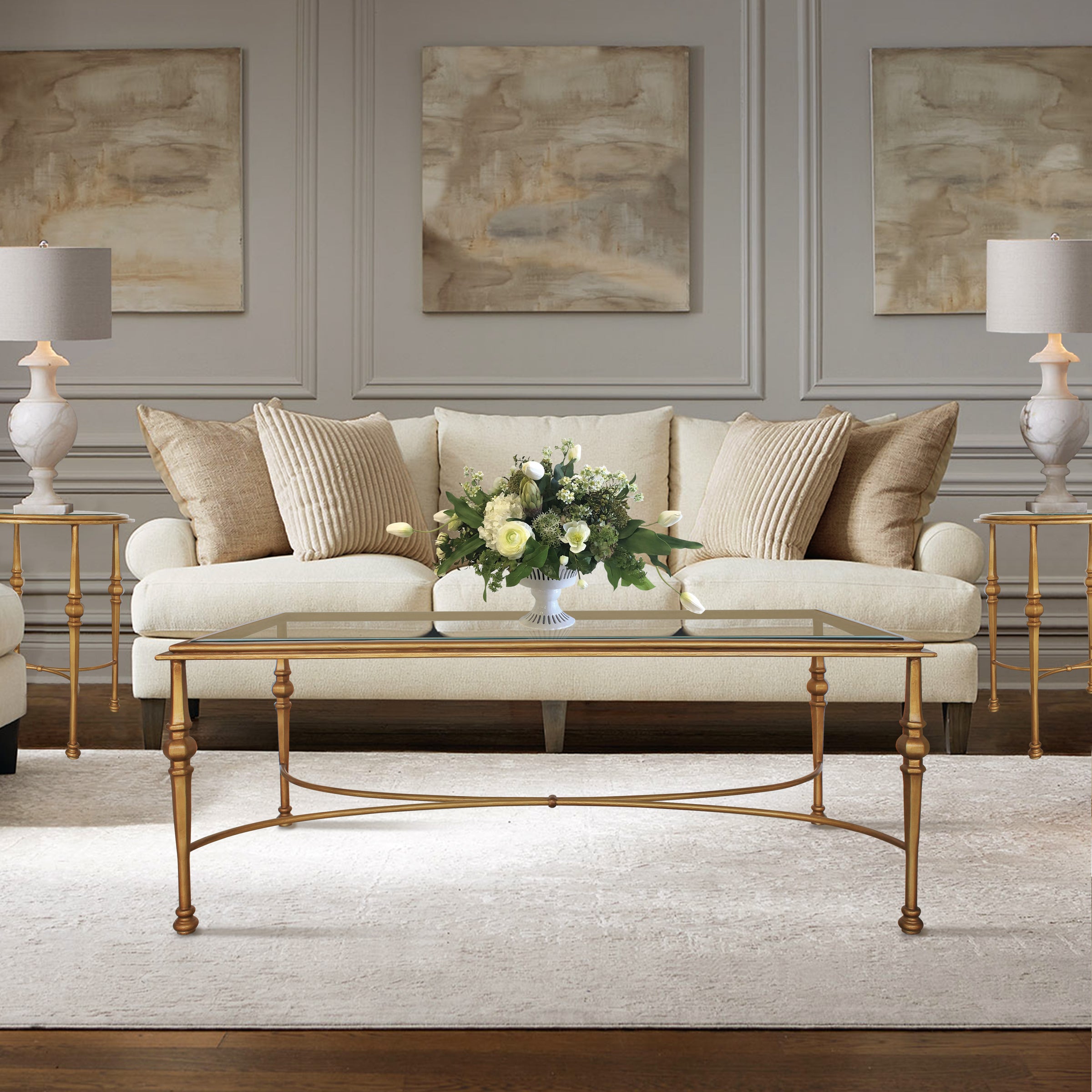 Diana center table with symmetrical metal frame and glass top.