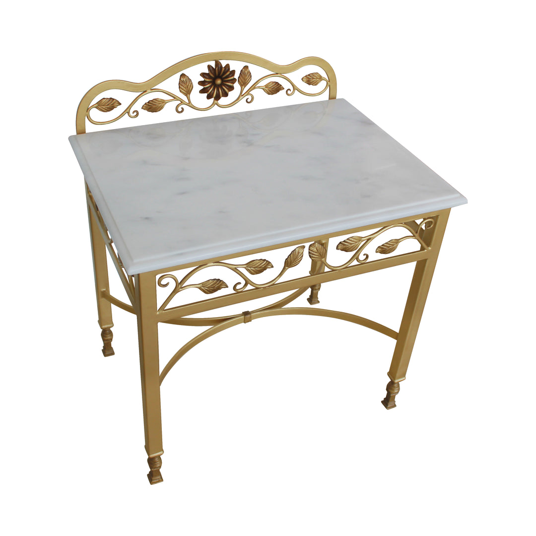 A classical metal nightstand painted in antique gold and topped with marble