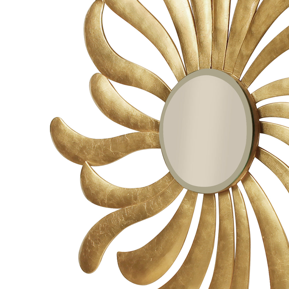 Close up shot of a golden mirror inspired by the rays of the sun in a golden leaf finish