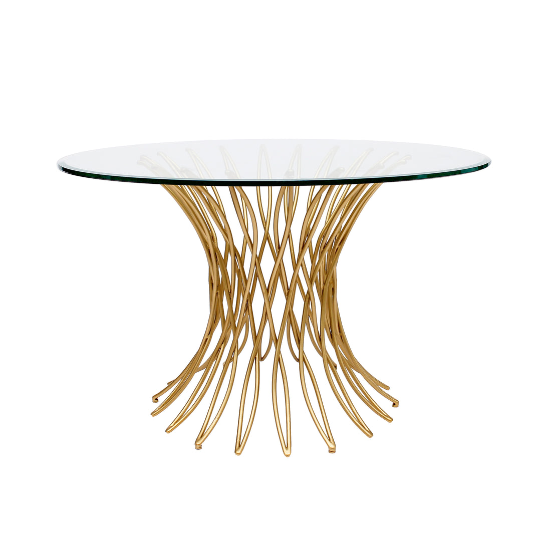 A contemporary round entryway table with a metal golden base and a clear glass top