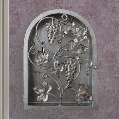 Frontal view of arched rustic key cabinet inspired from grape vines painted in antique silver